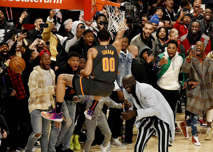 One of the most popular players to emerge from Africa, Tacko Fall (in striped pants) was an effective prop for Aaron Gordon’s dunk.